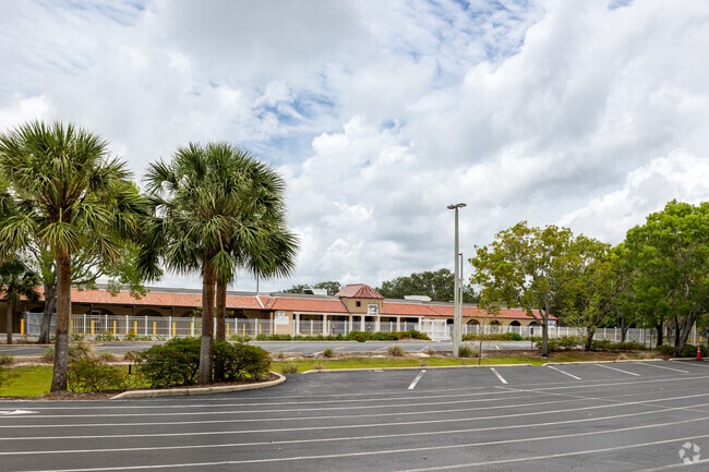 Naples Park Elementary School has ample parking in front, and a designated drop-off area.