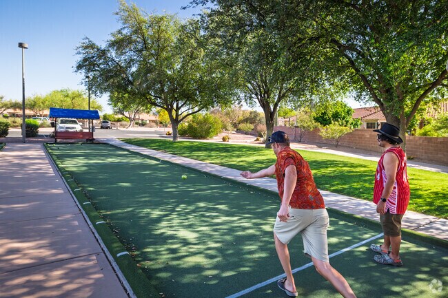 Residents play bocce ball at The Village Center in Continental Ranch Sunflower.