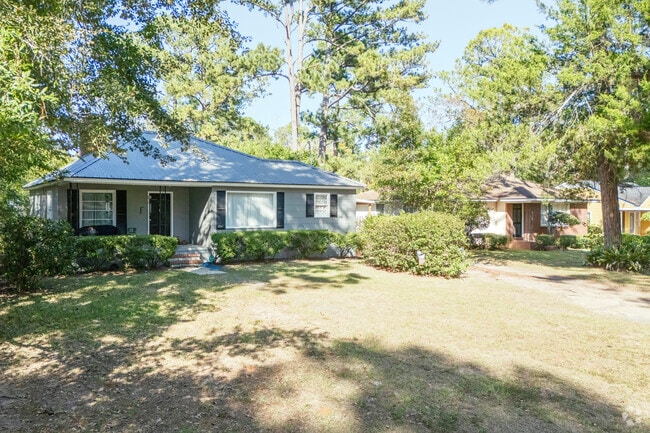 A row of ranch homes with mature plantings makes a good impression in the Palmyra Heights area.
