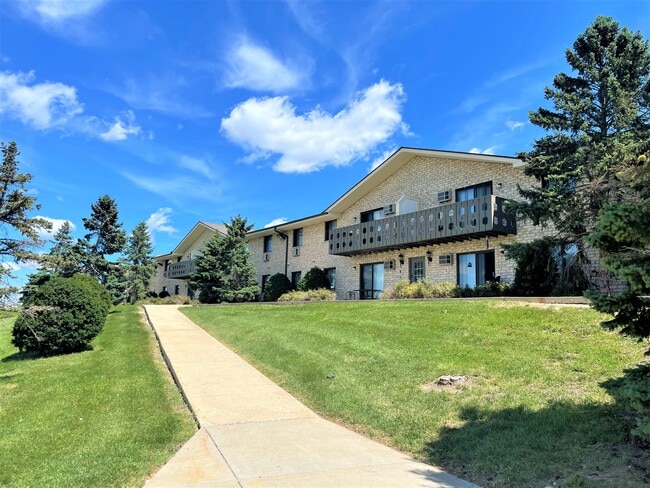 West side of property offers walkways with prairie views and greenspace