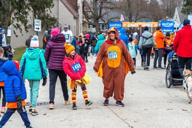 Full turkey costumes are commonplace during the Great Gobble Wobble in Oconomowoc, near Chenequa.