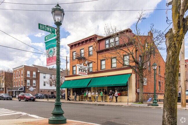Experience the original white clam pizza at Frank Pepe's in Wooster Square.
