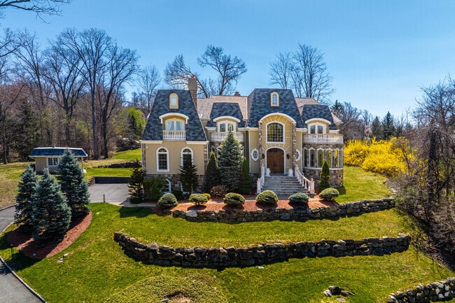 Live lavish in a large estate in the Franklin Lakes neighborhood.