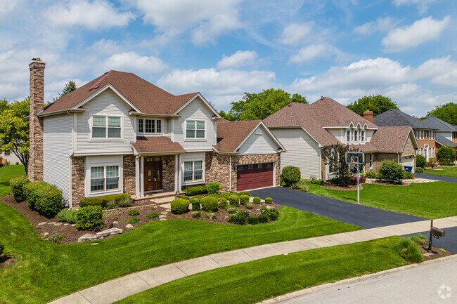 Homes in Greene Valley sport well-maintained lawns and sidewalks.