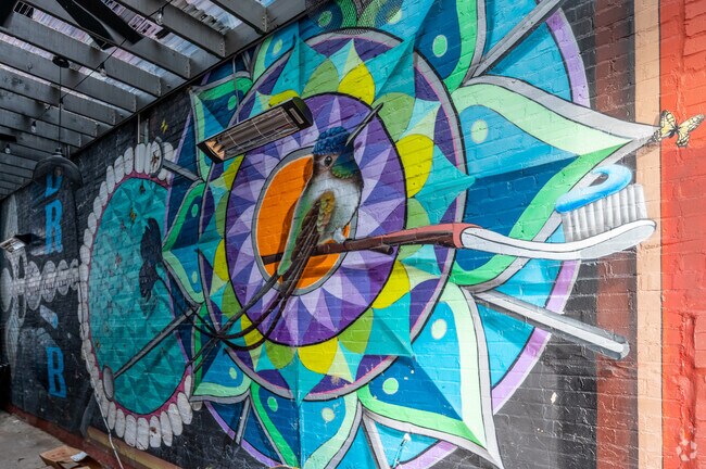 This unique mural in U Street depicts a hummingbird holding a toothbrush.