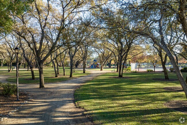 Residents enjoy the serene surroundings at Alamo Creek Park in Bucktown.