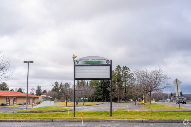 The Continuous Curriculum school is located near the Trent highway.