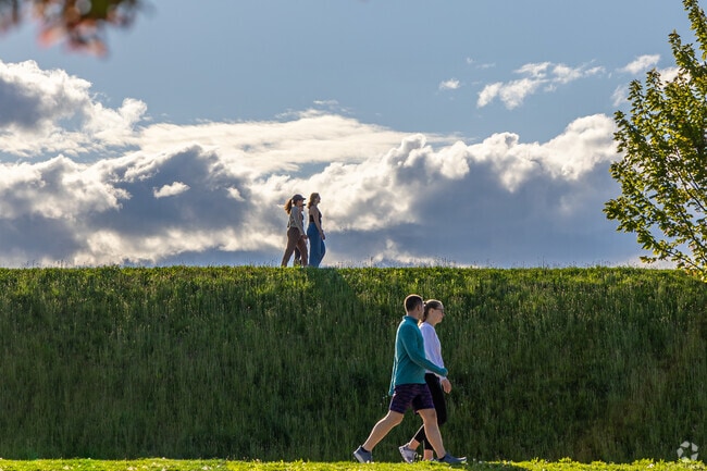 Residents of Brookline enjoy a walk along the Chestnut Hill Reservoir.