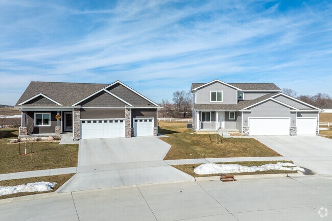 Brand-new construction homes in Granger feature stone and brick accents.