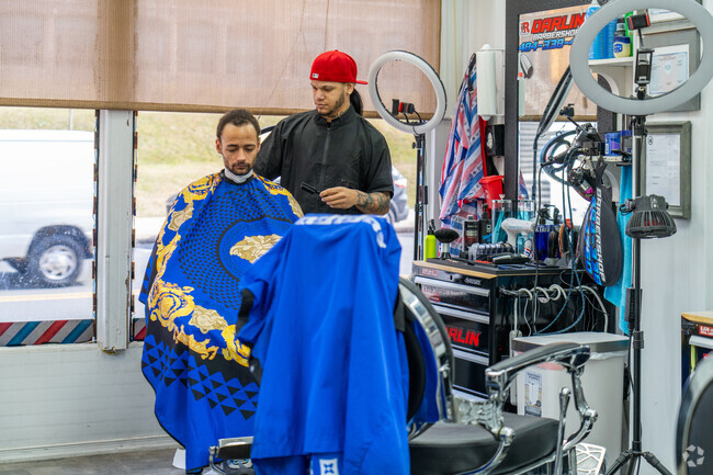 La Mina Barber Shop is where District 6 locals head for a fresh cut.