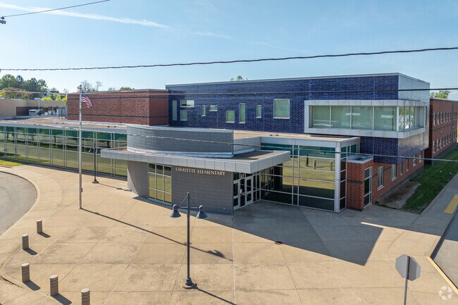 Lafayette Middle School welcomes students with a modern style covered patio entrance.