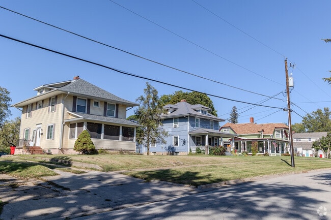 Single-family homes line a quiet residential street in Chariton.