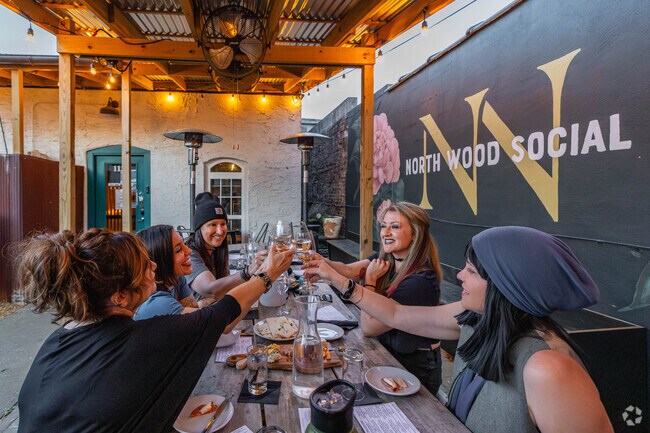 Friends love to gather and have great cocktails and food at North Wood Social in North Florence.