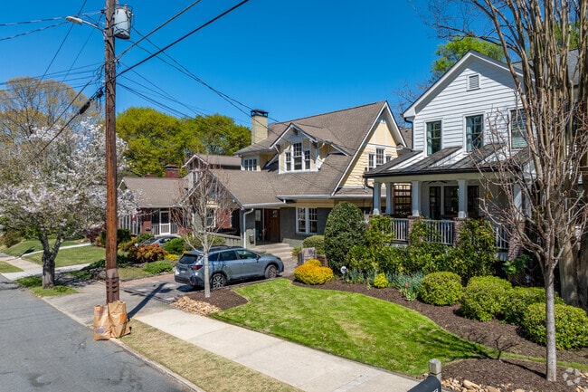 Newer homes and older bungalows line a typical Candler Park street.
