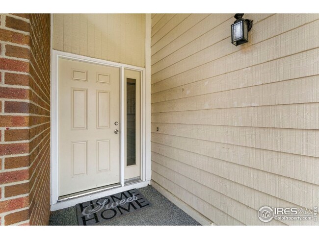 1418 Front Nine Dr unit D, Fort Collins, CO 80525 - photo 2