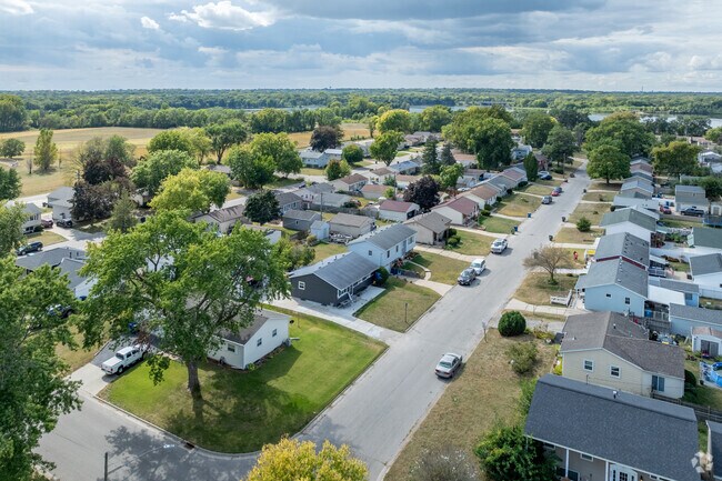 The Greenbrier neighborhood is nice and green with beautiful lakes around it.