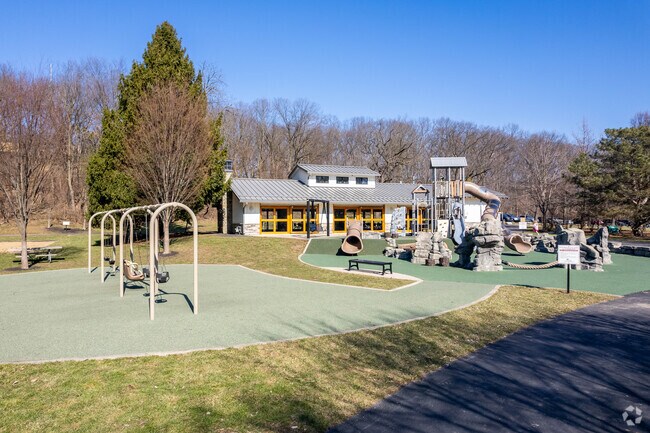 Wyman Woods Park features a unique playground and shaded walking paths.
