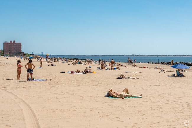 Kick back and listen to the ocean waves crash the Brighton Beach shoreline.