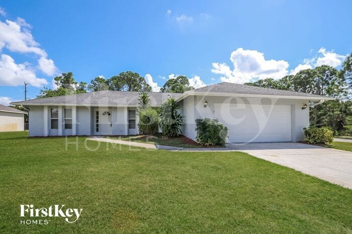 3265 SW Escarole St, Port Saint Lucie, FL 34953 - photo 1