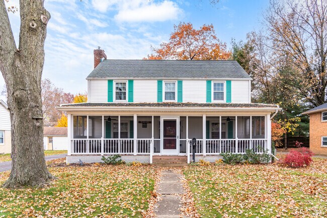 Two story homes with large covered porches feature throughout the Vassar Park neighborhood.