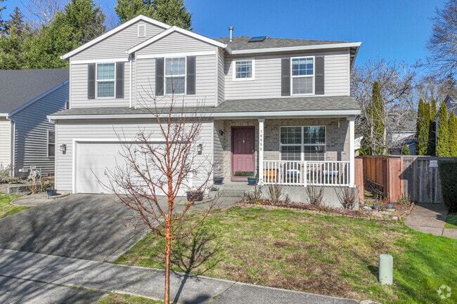 This older home in an established neighborhood of Orenco Station features a two-car garage.