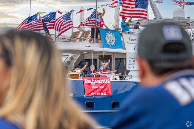 Over thirty boats participate in the Blessing of the Fleet parade in Kemah.