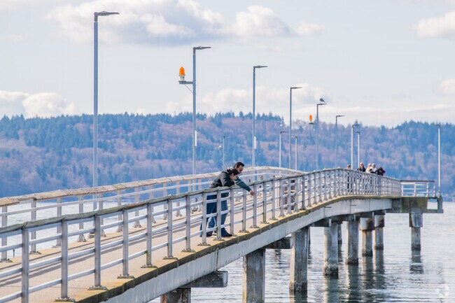 Walk along the pier in downtown Des Moines near Pacific Ridge.