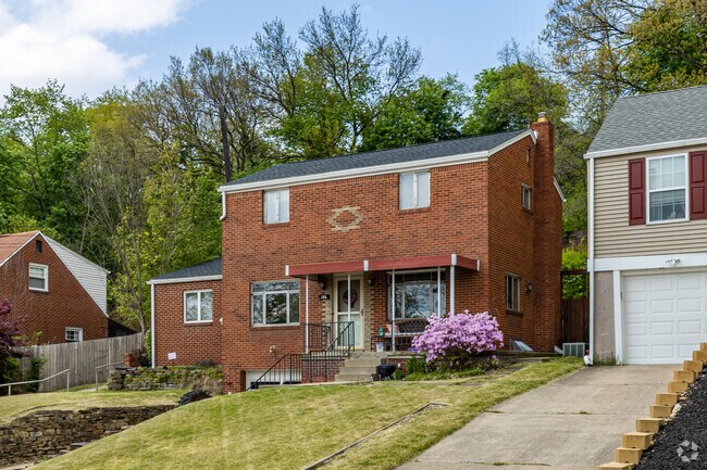 There are many different types of homes in the Ingram area that sit up on hills away from the road.