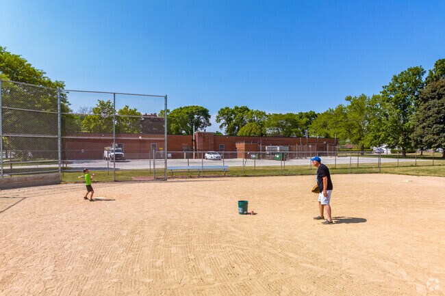 Playing ball at Arnold Klentz Park in the  Fairview neighborhood.