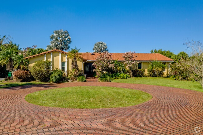 A beautiful Spanish inspired home in the Palm Beach Country Estates neighborhood.
