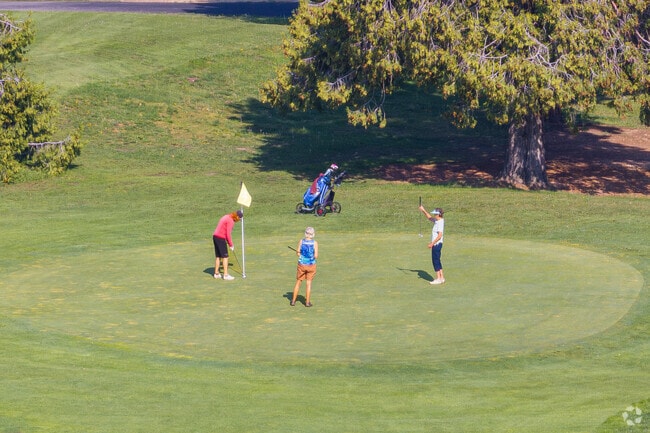 A group of Oak Knoll ladies finish off their round of golf at the 9th hole.