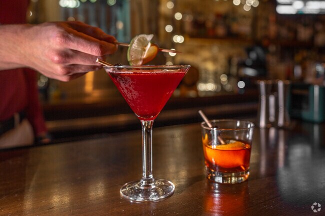 Grab a seat and order some cocktails at 1847 The Stamm House in Parkside Heights.