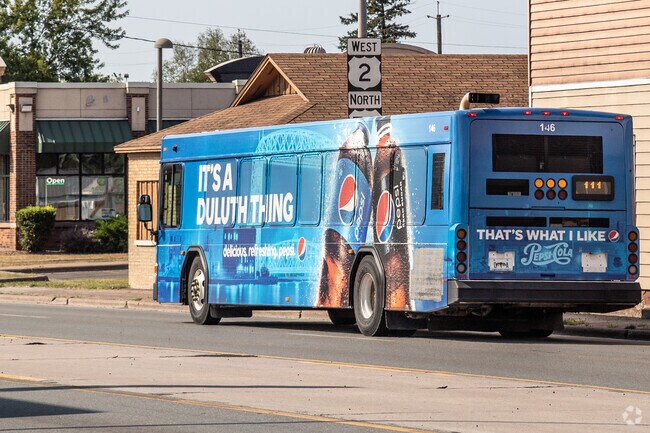 Duluth Transit Authority has lines all along Route 2 and Highway 53 from Central Park Superior.