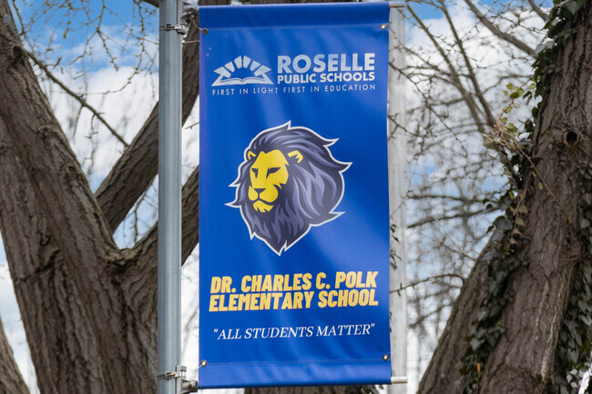 The student-teacher ratio in the Dr. Charles Polk School is 13 to 1.