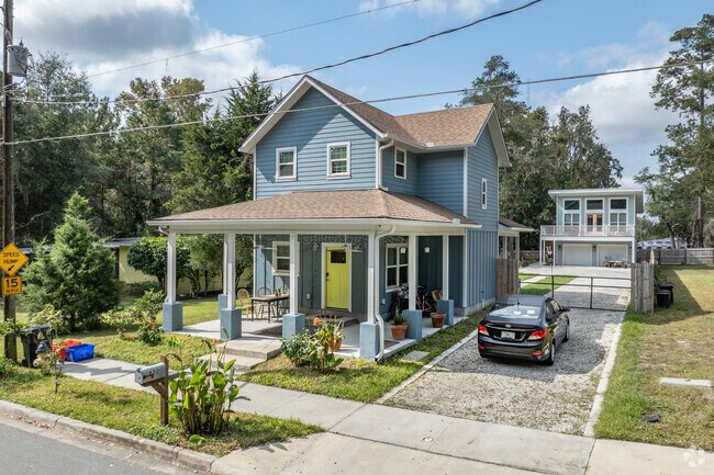 New homes in Springhill blend with historic cottages and ongoing development.