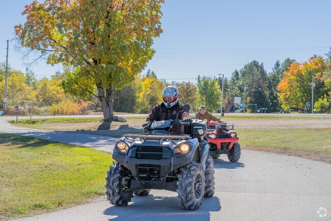 Locals enjoy riding ATVs on the Nicolet State Trail in the Mountain area.