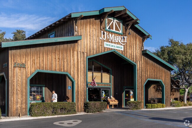 Locals in Cypress Ridge shop at JJ's Market for fresh groceries.