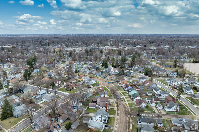 Aerial view of wooded residential streets in Greencroft Park.