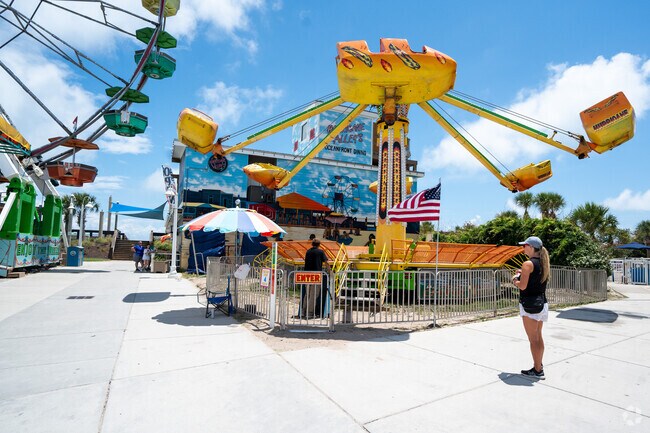 The boardwalk at Carolina Beach is a 20 minute drive from the Greenfield neighborhood.