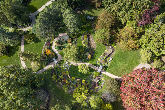 Foster Park in Fort Wayne has paths winding through the beautifully landscaped park grounds.