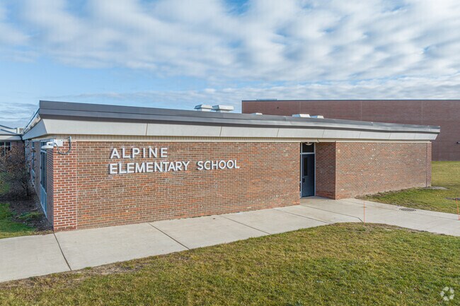 Alpine Elementary School in Comstock Park, Michigan receives a B- from Niche.