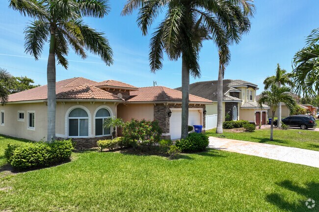Mediterranean homes line the streets of the Collier City neighborhood.
