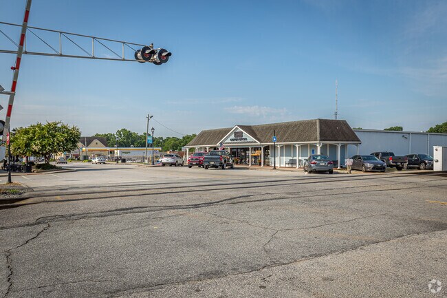 Historical train tracks are still in use and run directly through Tucker's downtown area.