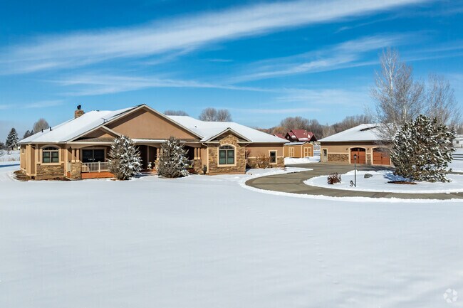 Larger ranch-style and custom homes sitting on acres of land are found on the outer edge of Riverton.