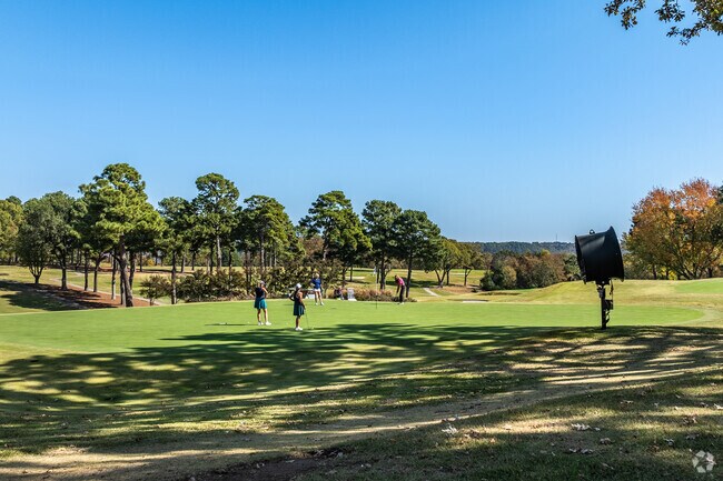 The golf course at the Country Club of Little Rock is a great place to tee off with friends.