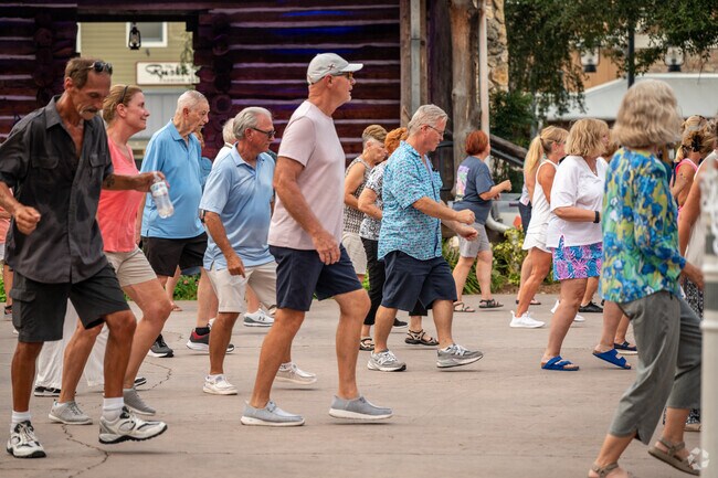 Buttonwood Villagers enjoy nightly entertainment at nearby town squares.