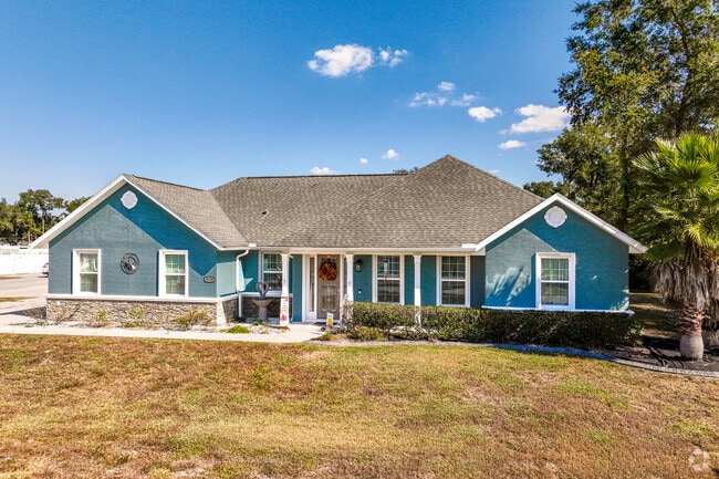 Colorful, ranch style home in a  charming community in Summerfield, Fl.