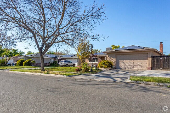 Tall shade trees are common in the yards of Roosevelt homes.