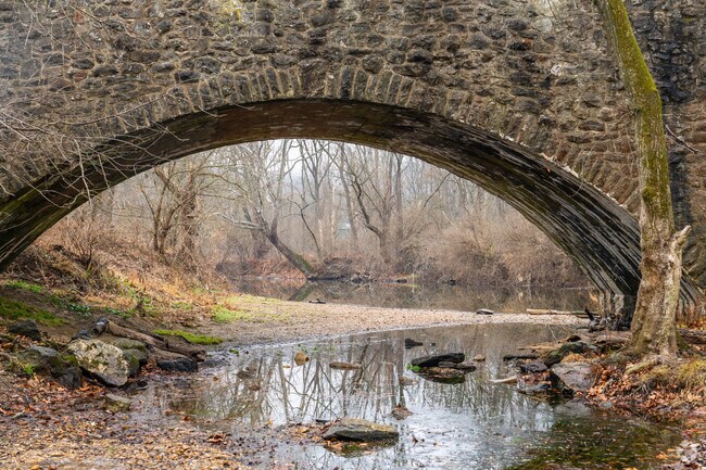 Historic stone bridges span West Brandywine Creel at ChesLen Preserve.