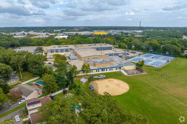 At Plainview Old Bethpage JFK High School 99% of students are at least proficient in math.
